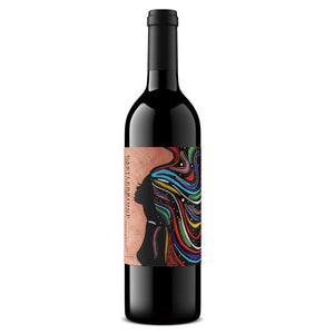 Cabernet Sauvignon Wine bottle with a colorful label featuring a silhouette of a woman with flowing hair on a white background.